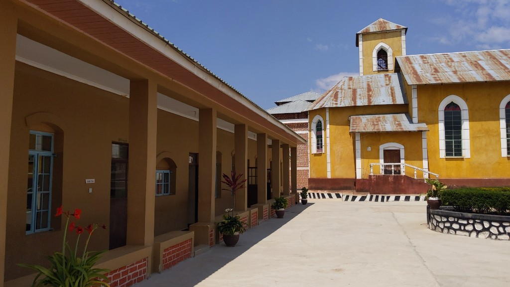 Historic red-brick campus buildings at Tosamaganga Secondary School